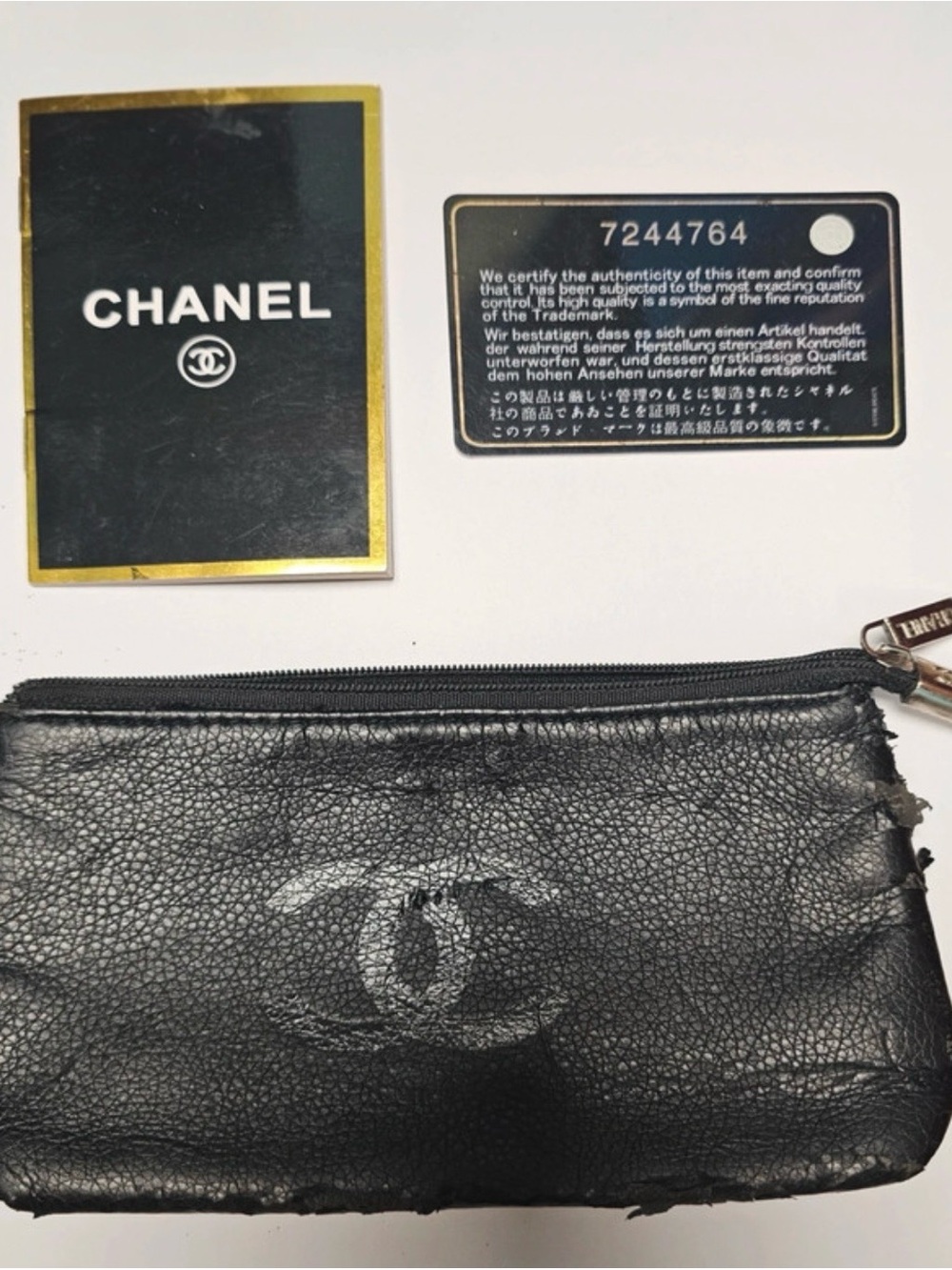 CHANEL Black Leather Coin Pouch with Embossed CC